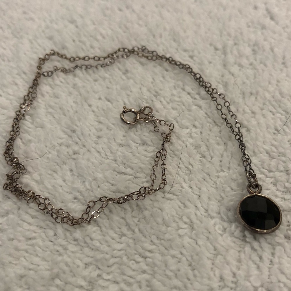 silver necklace with black s…